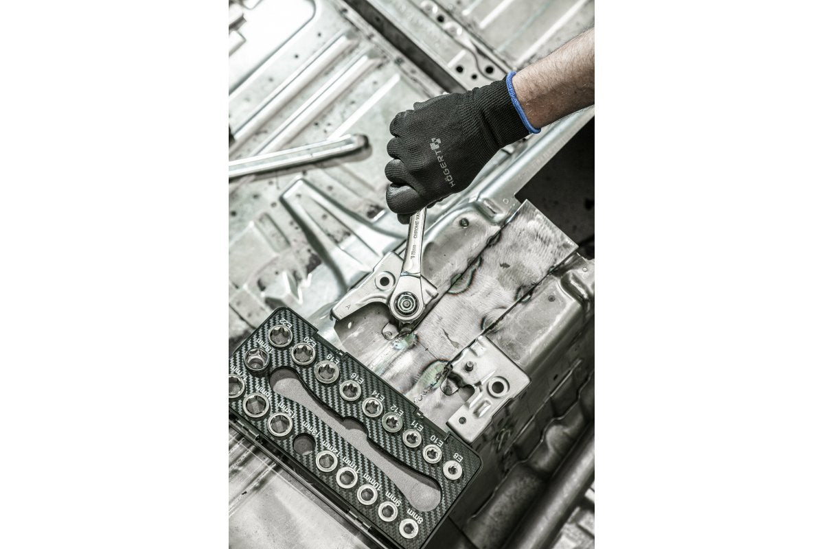 Ratchet ring spanner with sockets